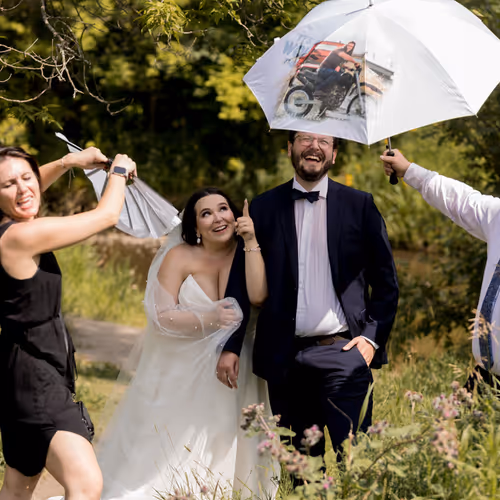first look photo featuring jacob black on an umbrella